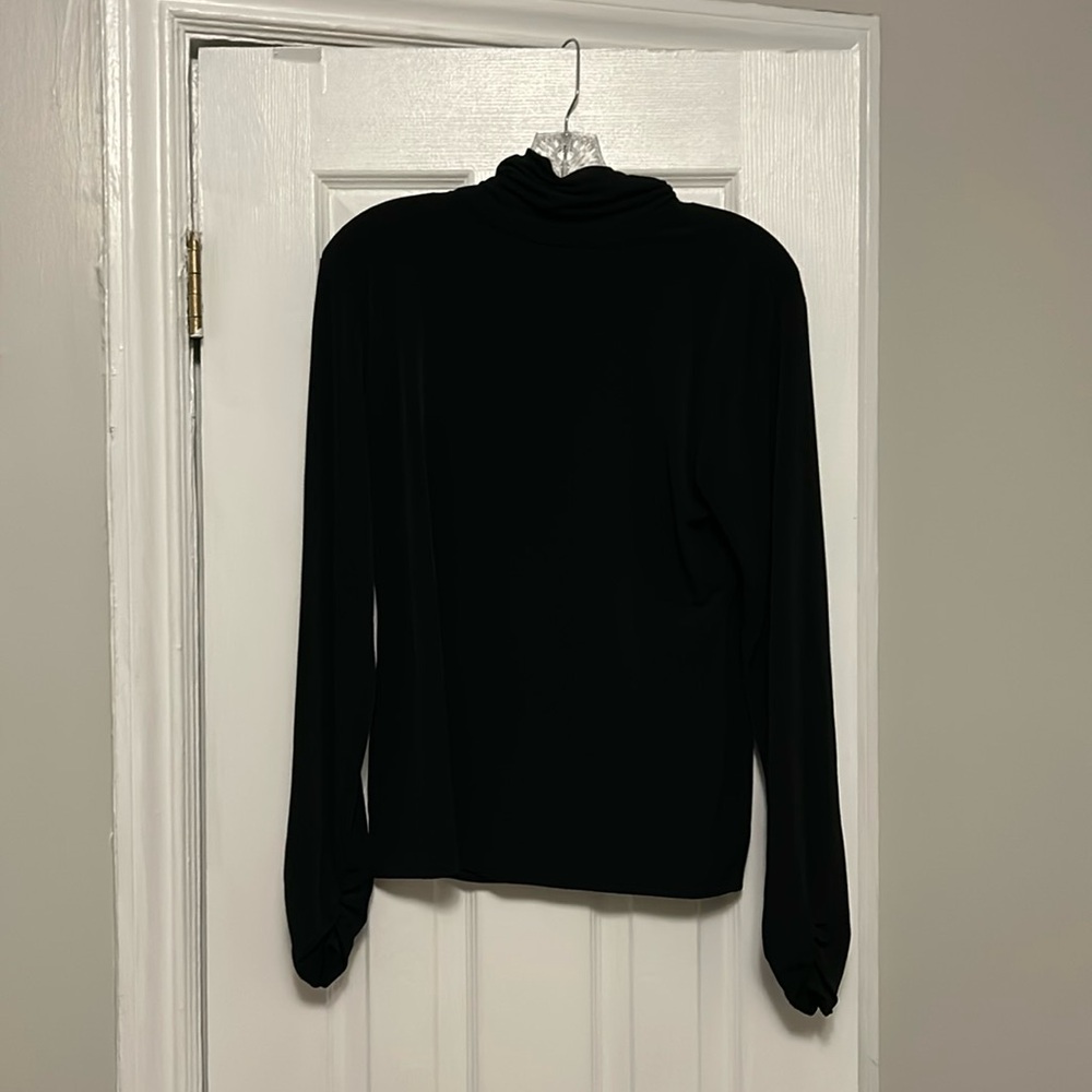 Worthington black turtleneck.